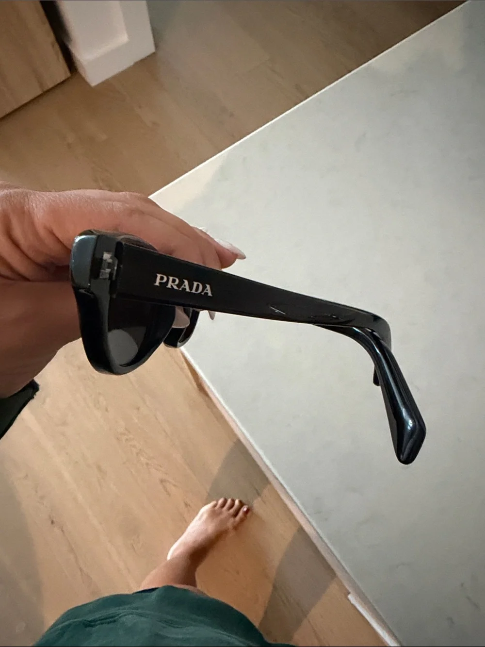 Prada Black Women's Rounded Cat-Eye Sunglasses